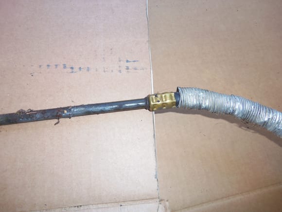 New 90 degree hose and crimp ferrule, with corrosion on the line.