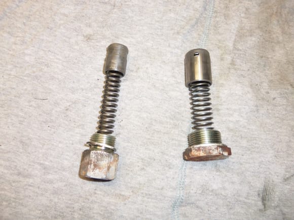 Oil pressure regulator on left, bypass on right. These are how they came out of the engine.