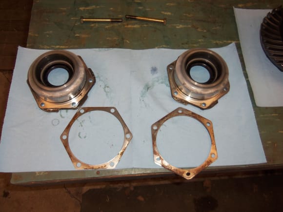 Bearing caps and their spacer shims.