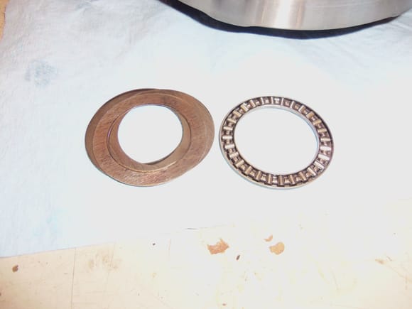 Roller thrust bearing, rotation washer, and shims. The order these were removed from the K1 clutch was noted. These were carefully removed with a tiny magnet on a stick.