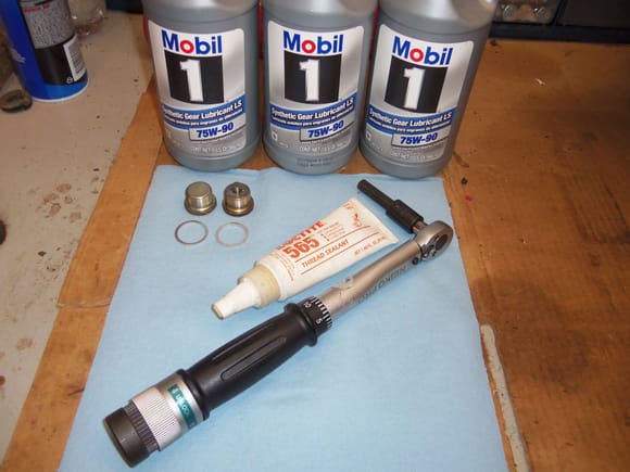 Gear oil, fill & drain plugs, new crush rings, PTFE sealant, and the all important torque wrench.