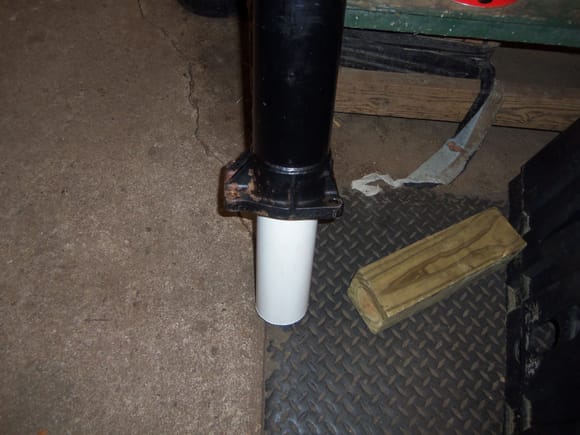 Beating the vibration damper into place, fence post driver style.