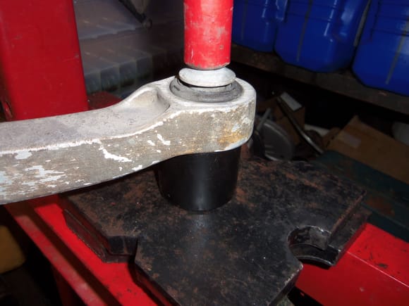 Pressing test bushing out of Red Witch upper control arm.