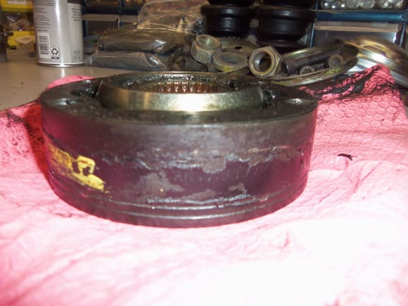 No machined rings in the CV joint body at the same end as the raised boss end of the hub and shoulder on the axleshaft.