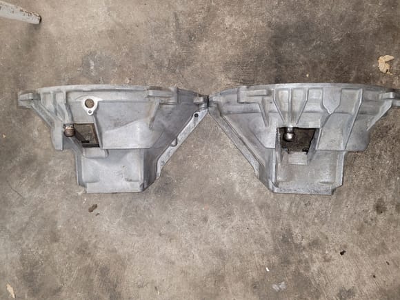 86.5 Bell housing on the left, late model on the right.