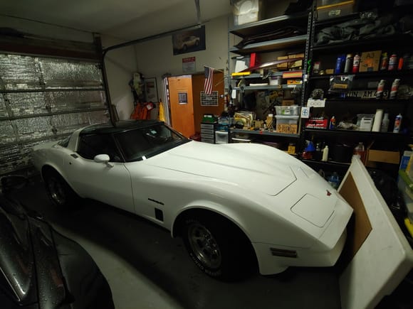 ^^^^ neighbor's pristine 82 corvette needed shelter - 928 is safely immobile on a lift at a shop! 