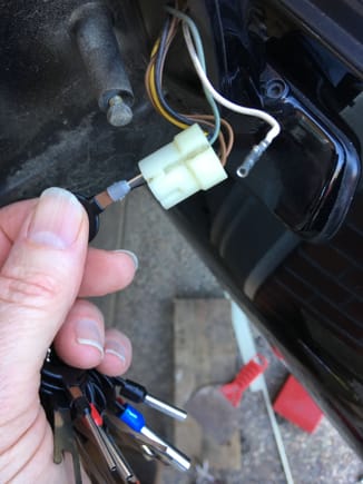 Depin the barrel connector. Now the old harness can be removed. Take note of which pins go where