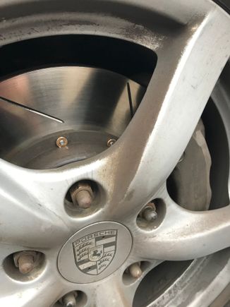 Bedding in new pads cleans up the rotors nicely. Never mind the filthy wheels...