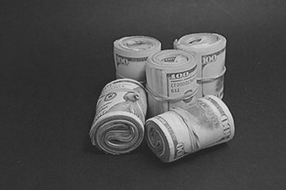 Step One: Locate suitable rolls of $100 bills lying around the house. Choose the two that are packed the tightest. (NOTE: $50s, $20s, & $10s are unsuitable for this application.)