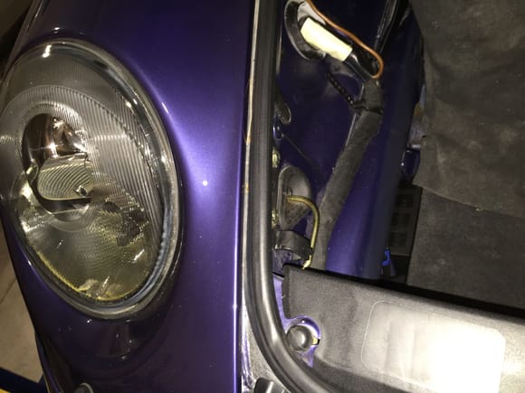 Rotate locking pin back to the 9:00 position to secure headlight