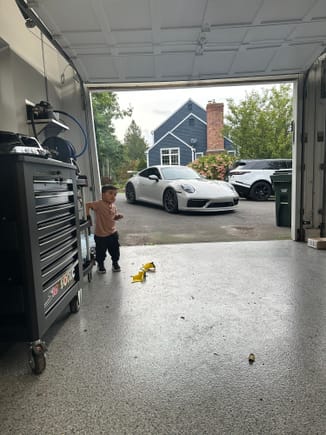 My little guy just doin his thing with his future car 