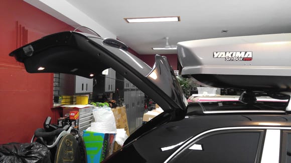 Black car is the same vehicle.  I actually did all this before installing the widebody kit and changing the color to the pearl white.  This shows clearance at the back of the Skybox with the hatch door fully open.