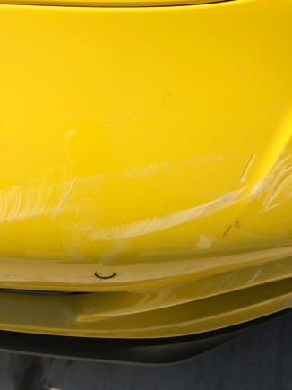 Most of the damage was to the clear bra but the paint was still scuffed underneath so I insisted on a new bumper cover. 