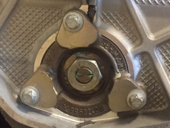 I had already ordered my replacement IMS bearing from Pelican Parts.  I noticed that my nut was MUCH bigger that what the book mentioned should be there.  Curious..I looked at the engine number on the bottom.  First time....