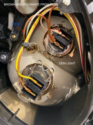 OEM high beam has mystery wire (?) compared to direct aftermarket connector. 