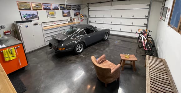 tiny 2 car garage at home, decide to keep most cars in warehouse and one at home and make it into a small man cave