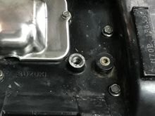 What goes in the hole to the right of the starter cover?