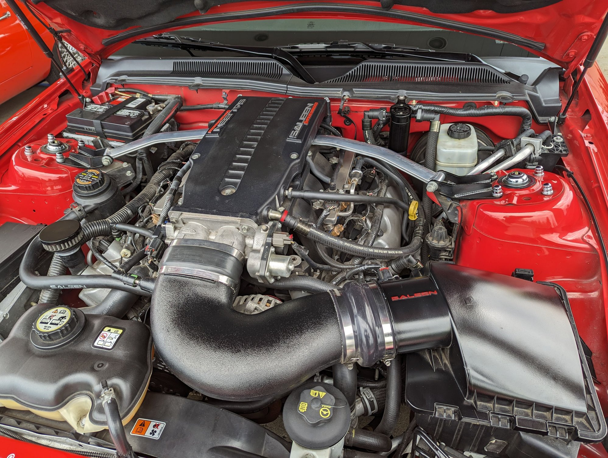 My 2006 GT w/catch can on the PCV drivers side location...