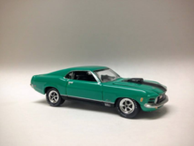 Finally, I found this Grabber Green '70 Mach 1. But, this will be the last Johnny Lightning I will ever buy. The chassis is totally warped and it wobbles like crazy. I was able to bend/fix the axles and chassis so it sits correctly.