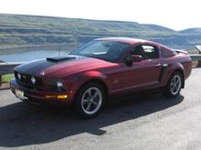 last summer pic...after I put on my new tires, re-stripped the hood, installed new spoiler and hood scoop, side scoop and side window scoops.....