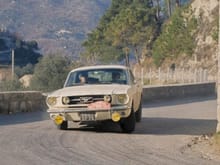 mustang races through the country at the 1966 monte carlo rally in monaco