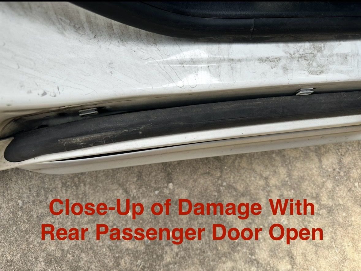 Additional close up of front passenger damage. 