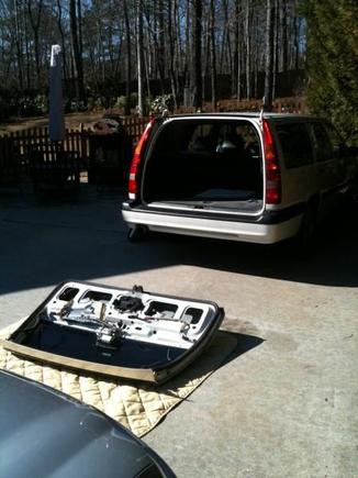 old shot fixing the old shattered hatch and installing the spoiler