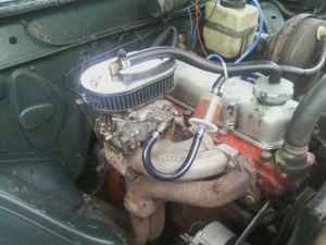 Engine, when I first got the car. Before header, and electronic distributor.