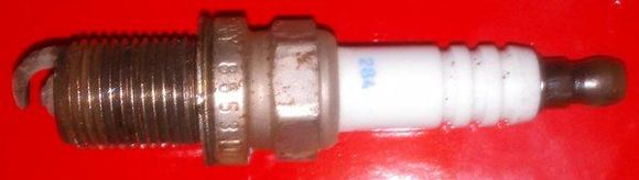 Old, dirty, burnt out spark plug.