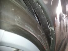 Right rear fender rolling, too far down.
