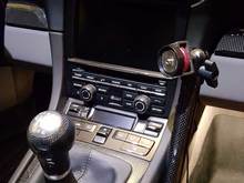 two of the magnetic phone holders mounted on the drivers side center console air vent. i have a Samsung Edge, and its firmly held in place this way.