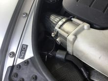 Just taped over the wires and tie wrapped up away from the fan and poly belt .