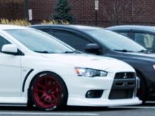 A small group of Mitsubishi Evo's.