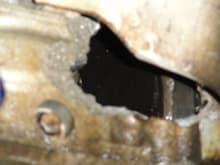Large hole that appeared in the block of a friend's Z06 Corvette in the very first session of the National Championship event. This is what happens when you grenade your engine...
