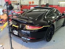 Removing badges on a black car isn't such a piece of cake. They come off easy but leave marks and outlines on the car. Had Rich from Gloss-it.com take care of it...he's the reason the vehicle shines like it does. True professionals!