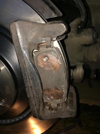 Pad fitted .Outside has two areas where the caliper claw fits .