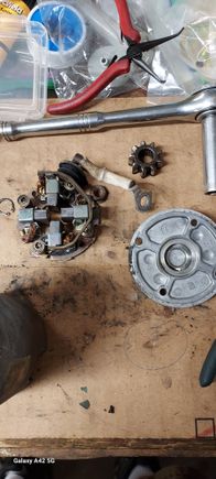 brushes, end cap and one of the 4 gears