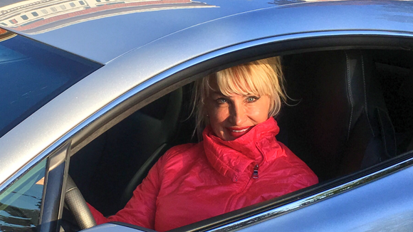 Mila driving the Aston Martin Vantage V8