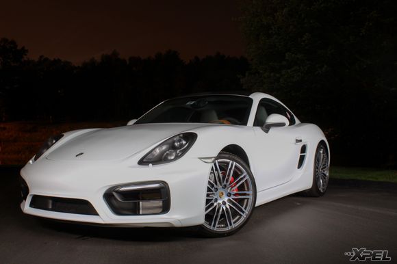 Light-paint shot of the STEALTH wrapped Porsche Cayman