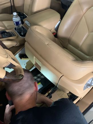 My friend started the project for me by getting the seat back, carpet pulled back and battery cover off.