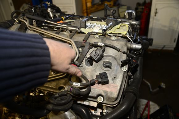 Make sure you blow out the holes with compressed air before removing the plugs. There is a lot of dirt down there
