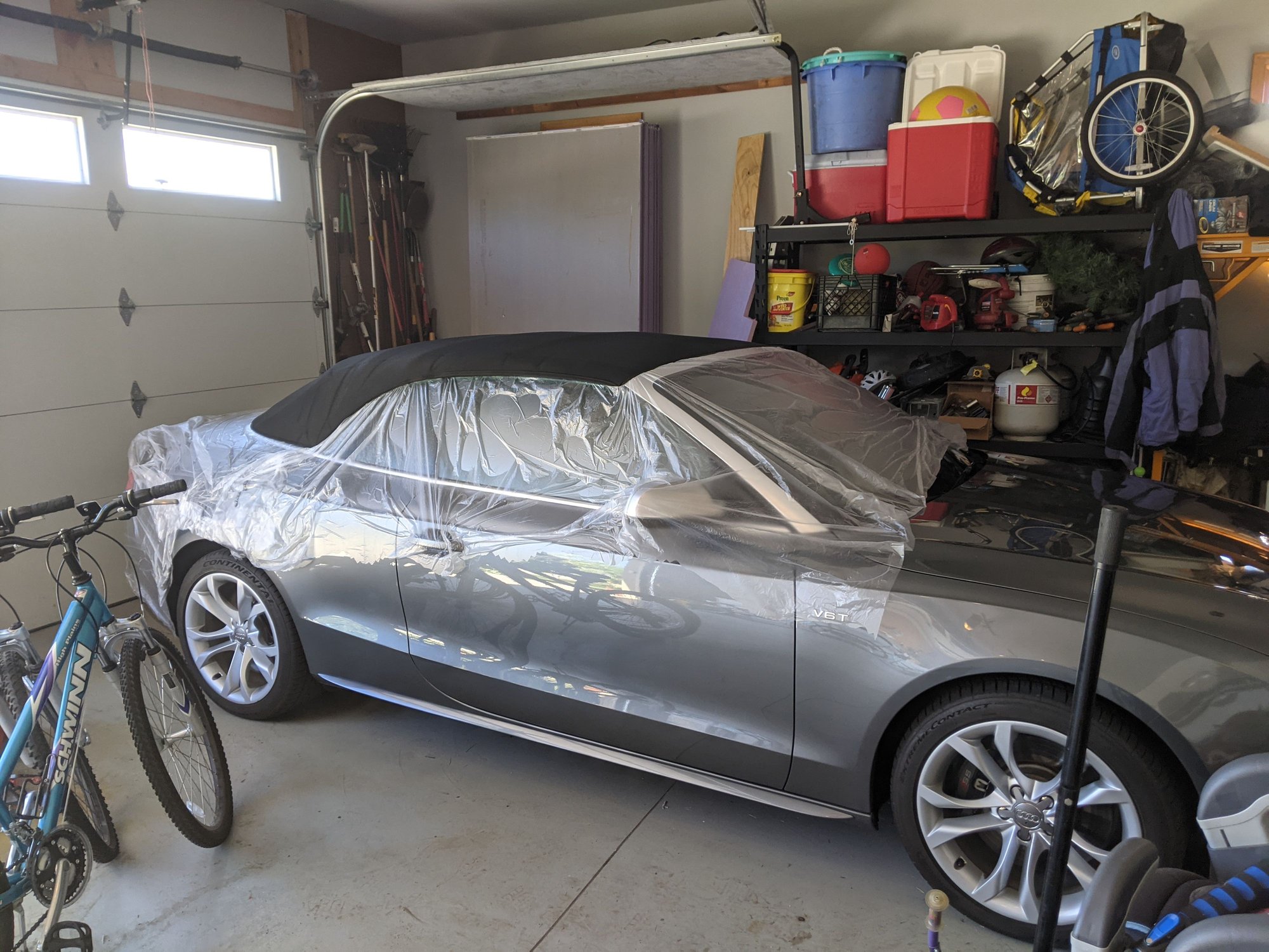 Treating top with Porsche Cabriolet Top Protectant and Waterproofer AudiWorld Forums