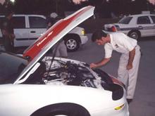 Jeff Gordon signing the car