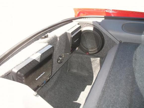 Rockford on amp rack and stealthbox.