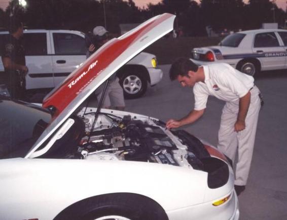 Jeff Gordon signing the car