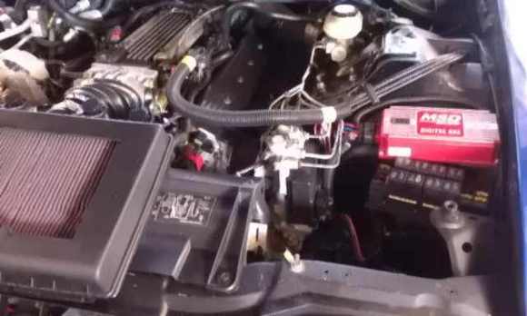 Blue Thunder's engine compartment. LT1 with 306 Comp Roller Cam, Ported &amp; Polished heads, K &amp; N filter, BBK twin 58 mm throttle bodies, NGK plugs, MSD wires, MSD 6AL digital ignition box, MSD coil, Hooker Headers.