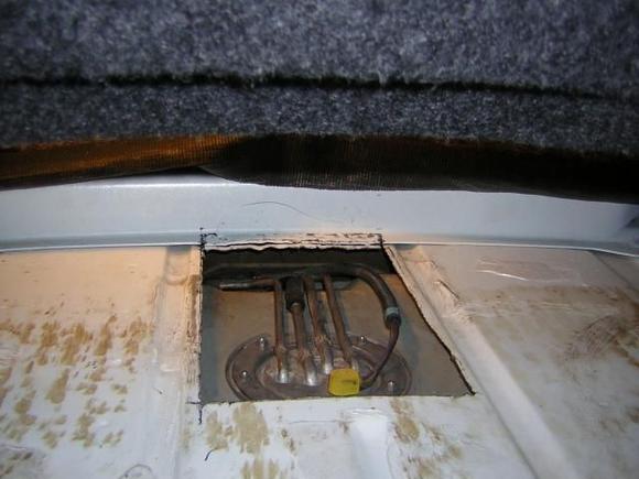 After I finishsed the job I bent the flange back down flat so I could install the steel cover for the trap door right up to it.