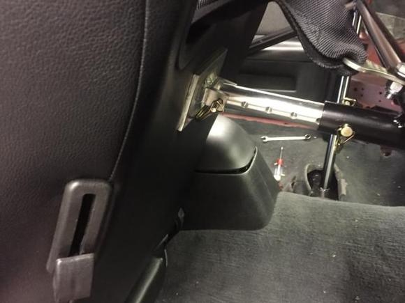 We fabricated a seat back support that can adjust for a smaller or larger driver.