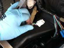 Loose connection, I believe it’s for the car lighter, but I don’t have an ashtrayor lighter in the mid console.