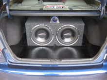 my trunk, 2 Audiobahn aw122t, sealed box, can't remember dimensions, 1.6 farad cap, 1/2&quot; mdf trunk liner